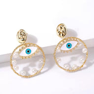 “Tehrangeles” pearl gold earrings